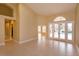 Bright and spacious living room with French doors to the pool area at 4832 Shoreline Cir, Sanford, FL 32771