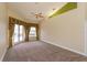 Spacious main bedroom with carpet and large windows at 4832 Shoreline Cir, Sanford, FL 32771