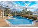 Relaxing screened pool and spa with lake view at 4832 Shoreline Cir, Sanford, FL 32771