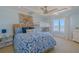 Coastal-themed bedroom with a king-size bed and bunk beds at 5501 S Atlantic Ave # 4150, New Smyrna Beach, FL 32169