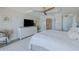 Spacious bedroom with king-size bed and ensuite bathroom access at 5501 S Atlantic Ave # 4150, New Smyrna Beach, FL 32169