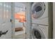 Stackable washer and dryer in convenient laundry room at 5501 S Atlantic Ave # 4150, New Smyrna Beach, FL 32169