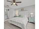 Spacious bedroom with a queen bed and ensuite bathroom access at 715 Siena Palm Dr, Celebration, FL 34747