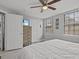 King bedroom with en-suite laundry and ample closet space at 715 Siena Palm Dr, Celebration, FL 34747