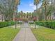 Charming courtyard with benches and a small fountain at 715 Siena Palm Dr, Celebration, FL 34747