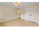 Bedroom with tile floors and double door closet at 7884 Broken Arrow Trl, Winter Park, FL 32792