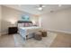 Bright bedroom with a king-size bed and plenty of space for furniture at 7884 Broken Arrow Trl, Winter Park, FL 32792