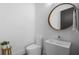 Stylish bathroom with a modern vanity and large mirror at 830 W Canton Ave, Winter Park, FL 32789