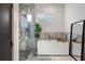 Modern bathroom featuring a freestanding tub and glass shower at 830 W Canton Ave, Winter Park, FL 32789