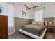 Cozy bedroom with wood floors, window light and modern decor at 830 W Canton Ave, Winter Park, FL 32789