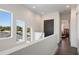 Bright hallway with views into bedroom and laundry area at 830 W Canton Ave, Winter Park, FL 32789