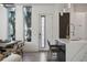 Modern kitchen island with marble countertops and breakfast bar at 830 W Canton Ave, Winter Park, FL 32789