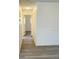 Bright hallway with light grey vinyl flooring at 8429 Sw 105Th Pl, Ocala, FL 34481