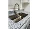 Modern kitchen sink and granite countertop at 8429 Sw 105Th Pl, Ocala, FL 34481