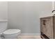 Simple yet updated half bathroom with a modern vanity and toilet at 858 Cardinal Pointe Cv, Sanford, FL 32771