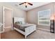 Charming bedroom with a white bed frame and a large window at 858 Cardinal Pointe Cv, Sanford, FL 32771