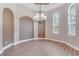 Elegant dining room with hardwood floors and arched niches at 858 Cardinal Pointe Cv, Sanford, FL 32771