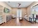 Spacious living room featuring hardwood floors and French doors at 858 Cardinal Pointe Cv, Sanford, FL 32771