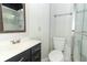 Clean bathroom with toilet, sink, and shower at 913 Carlson Dr, Orlando, FL 32804