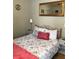 Charming bedroom with floral bedding and nightstands at 9132 Via Bella Notte, Orlando, FL 32836