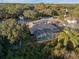 Aerial view showcasing the home, pool, and surrounding landscape at 9451 Brownwood Ct, Oviedo, FL 32765