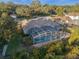 Aerial view of house with pool and screened enclosure at 9451 Brownwood Ct, Oviedo, FL 32765