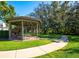 Community gazebo with picnic tables and grill at 9451 Brownwood Ct, Oviedo, FL 32765