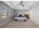 Spacious primary bedroom with plush carpet and ample natural light at 9511 Nautique Ln, Winter Garden, FL 34787