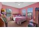 Charming bedroom with pink walls and plenty of space at 9511 Nautique Ln, Winter Garden, FL 34787