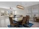 Casual dining area with wood table and access to the living room at 9511 Nautique Ln, Winter Garden, FL 34787