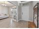 Bright entryway with wood-look tile floors and french doors at 9511 Nautique Ln, Winter Garden, FL 34787