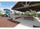 Covered playground with picnic tables and play equipment at 9511 Nautique Ln, Winter Garden, FL 34787