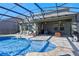 Relaxing poolside patio with covered lanai and outdoor seating at 9511 Nautique Ln, Winter Garden, FL 34787