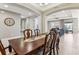 Open concept dining room with hardwood table and chairs at 1040 Sadie Ridge Rd, Clermont, FL 34715