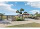 Fenced dog park with seating area at 1040 Sadie Ridge Rd, Clermont, FL 34715