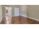 Large bedroom with hardwood floors and ample closet space at 106 Canterbury Dr, Haines City, FL 33844