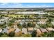 Aerial view of neighborhood near golf course and greenhouses at 1105 Harbor Hill St, Winter Garden, FL 34787