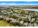 Aerial view of houses near a golf course and bay at 1105 Harbor Hill St, Winter Garden, FL 34787