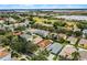 Aerial view showcasing a residential area near a golf course at 1105 Harbor Hill St, Winter Garden, FL 34787