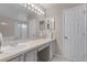 Double vanity bathroom with a large mirror and separate shower at 1105 Harbor Hill St, Winter Garden, FL 34787