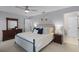 Main bedroom with ample closet space and ceiling fan at 1105 Harbor Hill St, Winter Garden, FL 34787