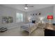 Cozy bedroom with a metal bed frame and built-in shelving at 1105 Harbor Hill St, Winter Garden, FL 34787