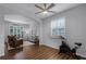 Exercise room featuring wood flooring and an exercise bike at 1105 Harbor Hill St, Winter Garden, FL 34787