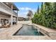 Luxury pool with waterfall feature at 1105 Harbor Hill St, Winter Garden, FL 34787