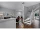 Elegant staircase with hardwood floors and white railings at 1105 Harbor Hill St, Winter Garden, FL 34787