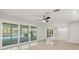 Bright Gathering room with pool view, tile floors, and sliding glass doors at 1141 Edgewood Ranch Rd, Orlando, FL 32835