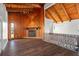 Living room features a corner fireplace and hardwood floors at 1141 Edgewood Ranch Rd, Orlando, FL 32835