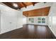 Main bedroom with hardwood floors, double doors and lake views at 1141 Edgewood Ranch Rd, Orlando, FL 32835