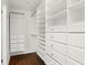 Large walk-in closet with ample shelving and drawers at 1141 Edgewood Ranch Rd, Orlando, FL 32835