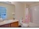 Bathroom with shower/tub combo, toilet and vanity at 115 Essex Pl, Davenport, FL 33896